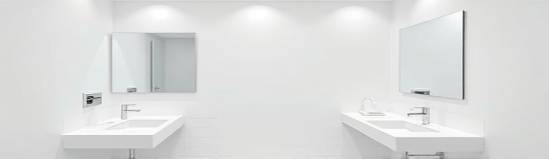 minimalist bathroom, serene, simplistic design, photorealistic, with seamless white surfaces and frameless mirrors, highly detailed, slight fog on mirror edges, UHD, bright white color palette, diffused light, shot with an 85mm lens.